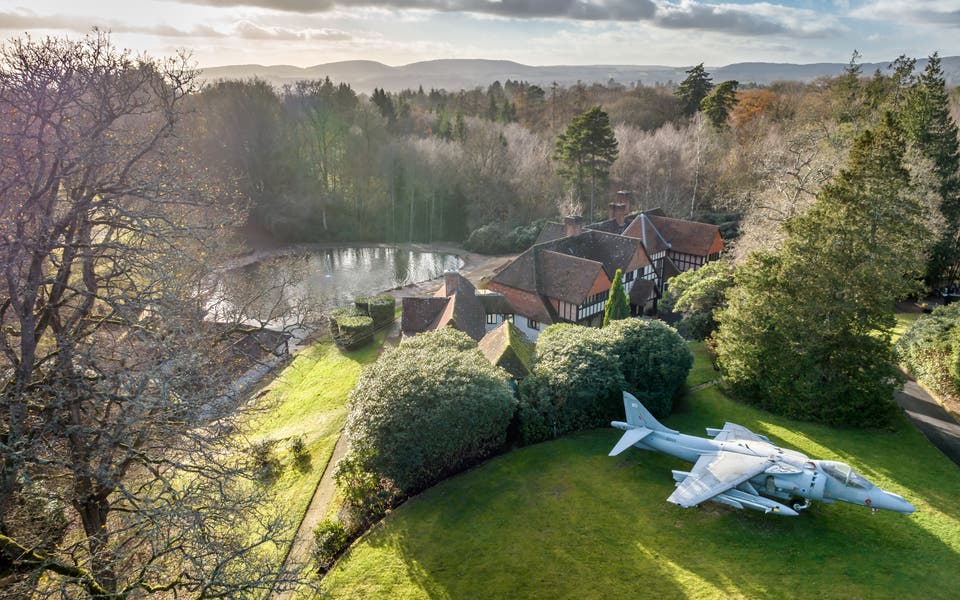 This £3.95 million mansion comes with a fighter jet parked on the lawn