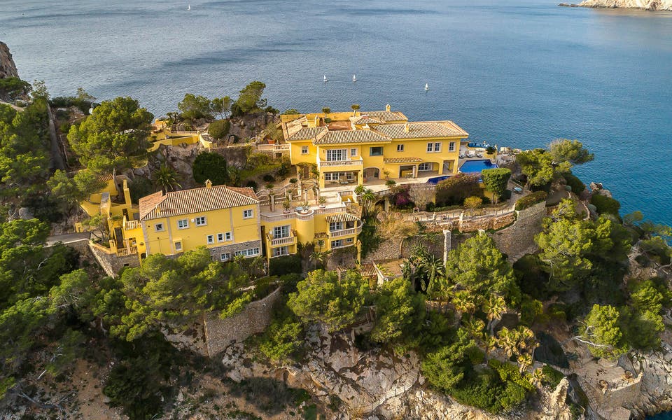 Al-Fayed's yellow villa from The Crown is available for rent on Airbnb